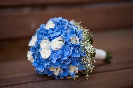 wedding bouquet of flowers on the benchの写真素材