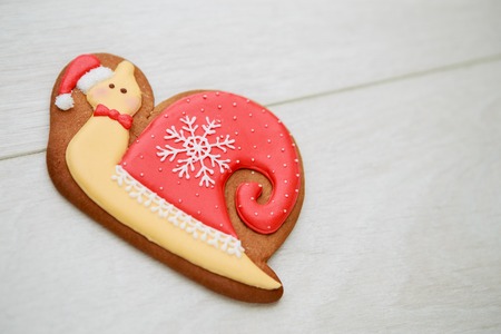 Christmas homemade gingerbread cookies on wooden backgroundの写真素材