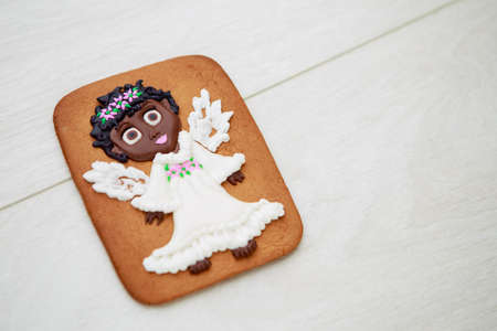 Christmas homemade gingerbread cookies on wooden backgroundの写真素材