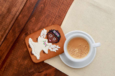 Christmas homemade gingerbread cookies on wooden background