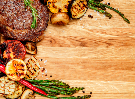 Roasted organic shin of beef meat on wooden tableの写真素材