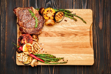 Roasted organic shin of beef meat on wooden tableの写真素材