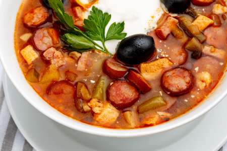 Solyanka - Russian traditional meat soup on white backgroundの写真素材