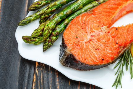 Studio shot of crispy roasted salmon steakの写真素材