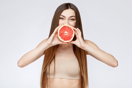 Beautiful Face of Young Woman with Clean Fresh Skin close up. Beauty Portrait. Beautiful Spa Woman Smiling. Perfect Fresh Skin. Pure Beauty Model. Youth and Skin Care Conceptの写真素材