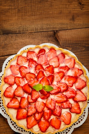 Traditional homemade strawberry cake on wooden backgroundの写真素材