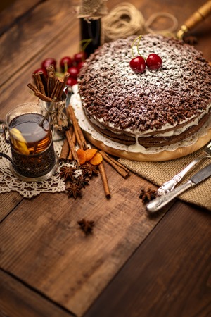Homemade chocolate pie on vintage wooden backgroundの写真素材