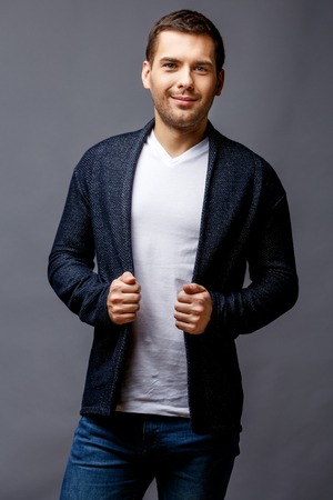 Cheerful young man in smart casual wearの写真素材