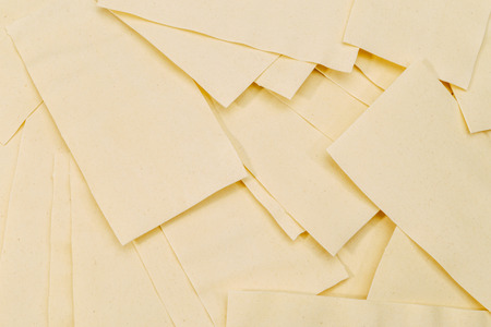 dried uncooked lasagna pasta sheetsの写真素材