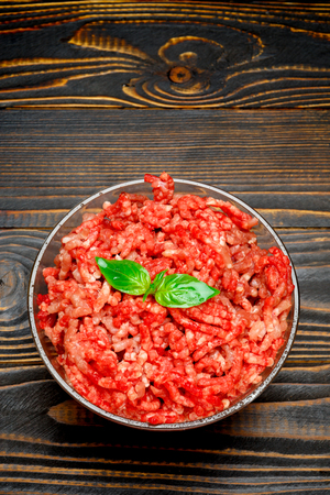 Minced meat of stuffing in glass bowlの写真素材