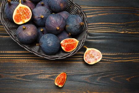 Fig isolated on wooden background