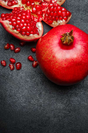 Organic Pomegranate and seeds close-up macro studio shotの写真素材