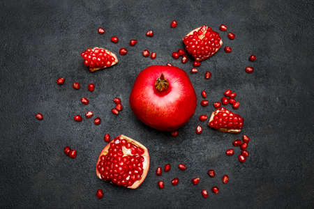 Pomegranate and seeds close-upの写真素材