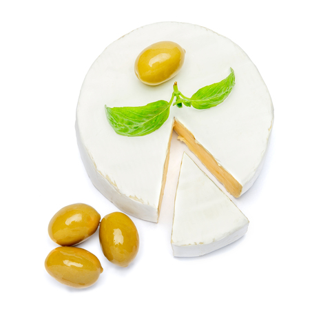 Round brie or camambert cheese on a white backgroundの写真素材