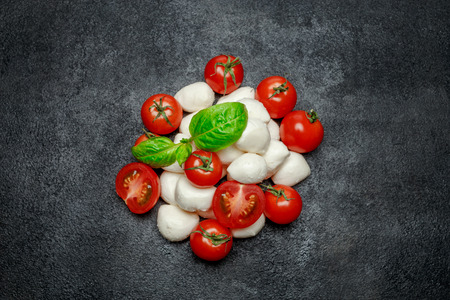 Italian mozzarella cheese and tomatos. Caprese salad ingridients