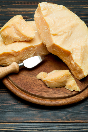 pieces of parmesan or parmigiano cheese and grapesの写真素材
