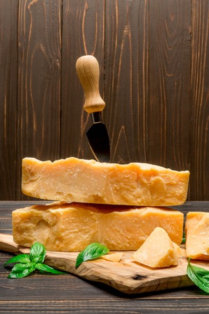pieces of parmesan or parmigiano cheese and grapesの写真素材