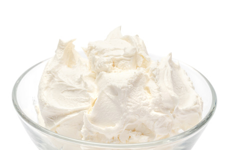 Traditional Mascarpone cheese in glass bowl isolated on white with clipping pathの写真素材