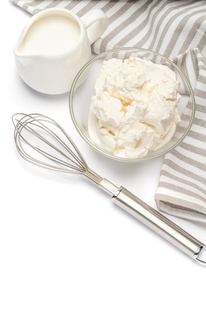 Traditional Mascarpone cheese and cream or milk isolatedの写真素材