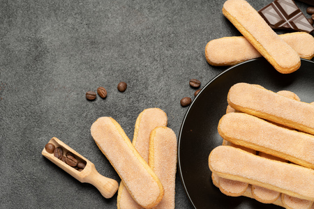 Italian Savoiardi ladyfingers Biscuits on concrete backgoundの写真素材