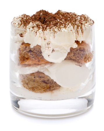 Classic tiramisu dessert in a glass isolated on a white background with clipping pathの写真素材