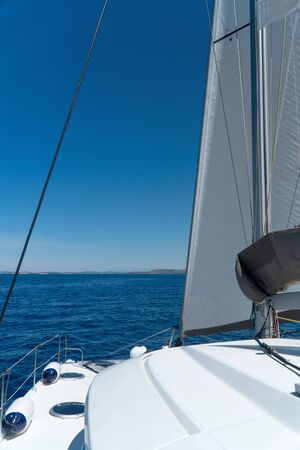 Catamaran sailing at sea in Croatia, Europeの写真素材