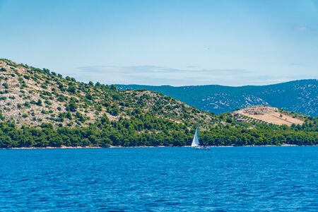 Lonely Yacht sailing on opened sea, Croatiaの写真素材