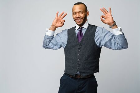 professional african-american business man - showing ok sign