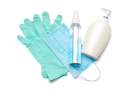 flat layout of hygiene items - latex gloves, mask and hand sanitizer or liquid soap isolated on white background with clipping parhの写真素材
