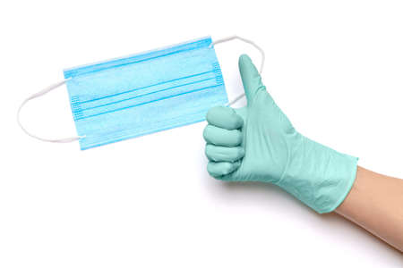Human hand in protective glove and face protective masks isolated on white background
