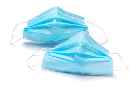 Disposable blue medical face mask isolated on white background with clipping path