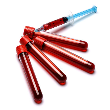 Medical syringe and plastic test tube isolated on white backgroundの写真素材