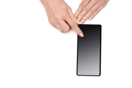 Top view of woman holding smartphone isolated on white background