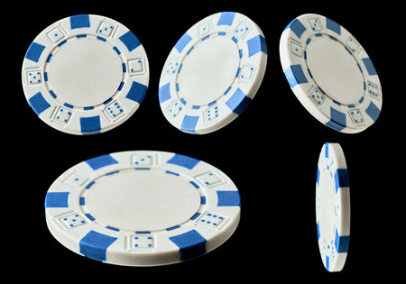 Set of Casino gambling chips isolated on black backgroundの写真素材