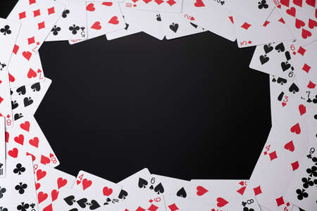 background made of playing cards top down view