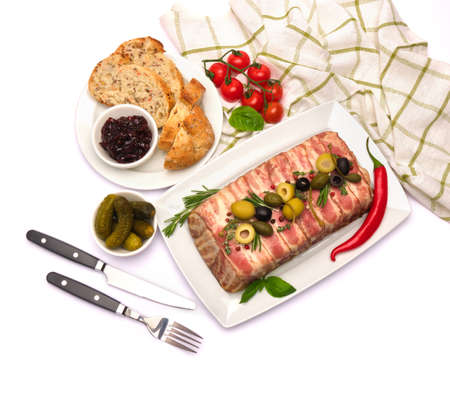 Traditional French terrine covered with bacon isolated on white background
