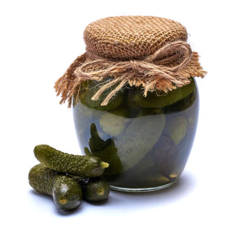 Can of Tasty green cornichons isolated on a white backgroundの写真素材