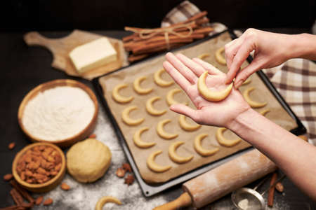Baking tray with traditional German or Austrian Vanillekipferl vanilla kipferl cookiesの写真素材