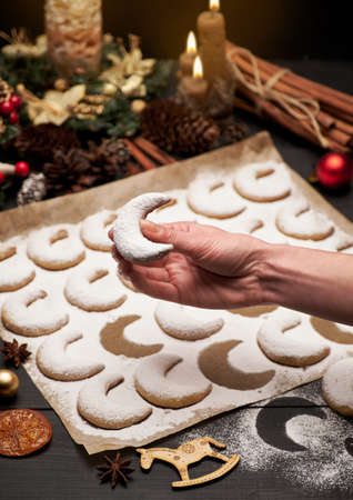 Traditional German or Austrian Vanillekipferl vanilla kipferl cookies on wooden tableの写真素材