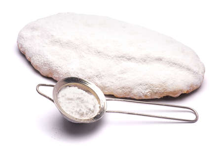 Traditional Christmas stollen cake with marzipan and dried fruit isolated on white backgroundの写真素材