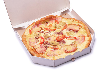 Pizza in a cardboard box isolated on white backgroundの写真素材