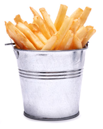 French fries potatoes in stylized metallic bucket isolated on white backgroundの写真素材