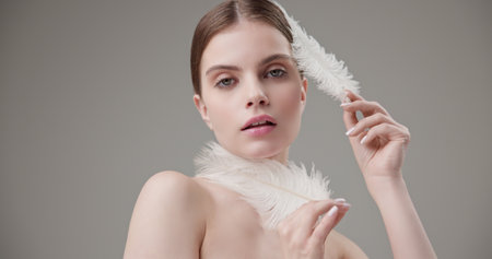 Beauty, health, cosmetics, anti-aging therapy and skin care concept - young beautiful brunette...
