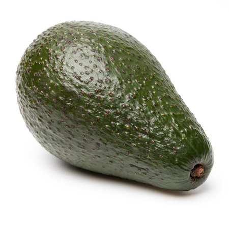 Healthy food and ingredients - Ripe organic green avocado fruit isolated on white background with built-in cutting pathの写真素材