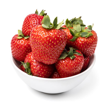 Healthy food and ingredients - Ceramic bowl with natural organic ripe strawberries isolated on white background with built-in clipping pathの写真素材