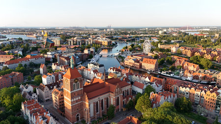 Aerial photo taken by drone over the historic tourist center of Gdansk, the city hall and the...