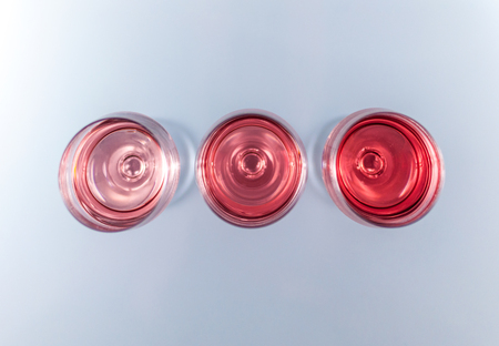 Isolated Pink wine on white background from aboveの写真素材