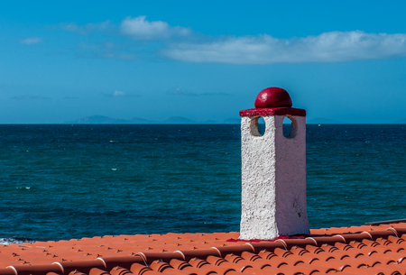 View of sardinian beach of PLatamona, in the Asinara gulf, from a typical white buildingの写真素材