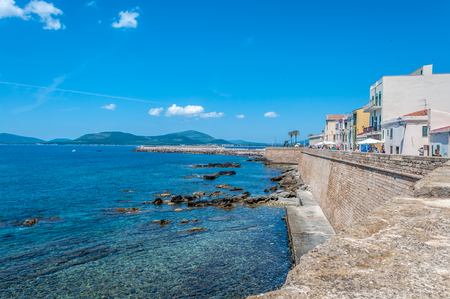 Lanscape of the city of Alghero - Sardinia in a sunny and cloudy day of springの写真素材