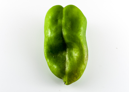 Closeup of isolated green pepper on white backgroundの写真素材